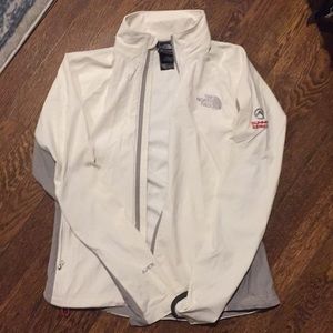 White North Face jacket with gray stripe